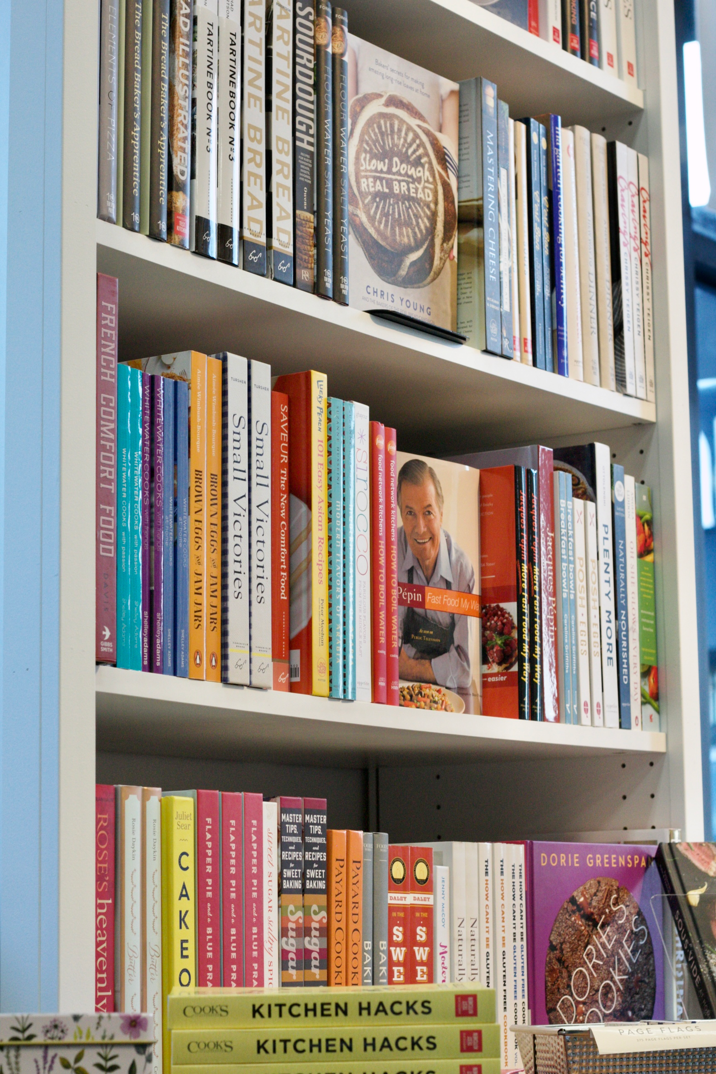 bookcase filled with cookbooks