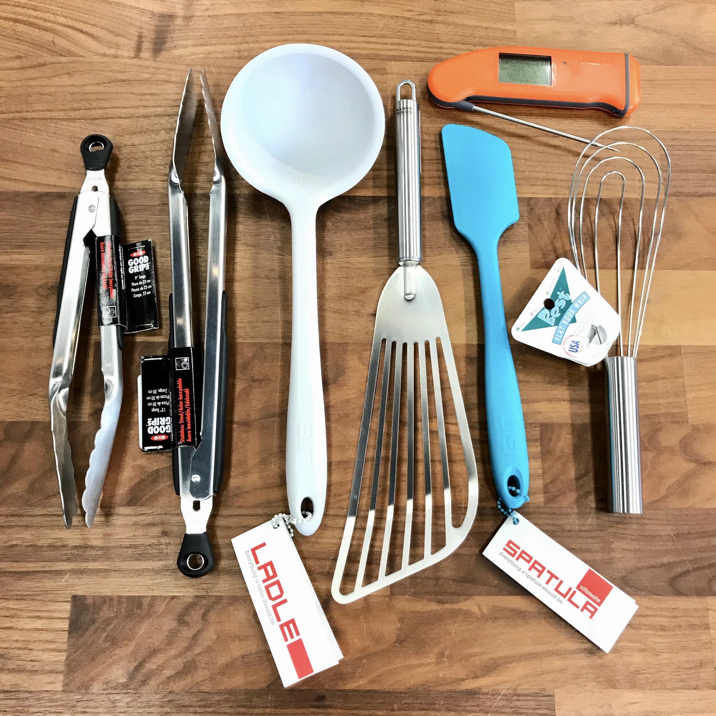 kitchen tools, tongs, spatulas, whisks and ladles