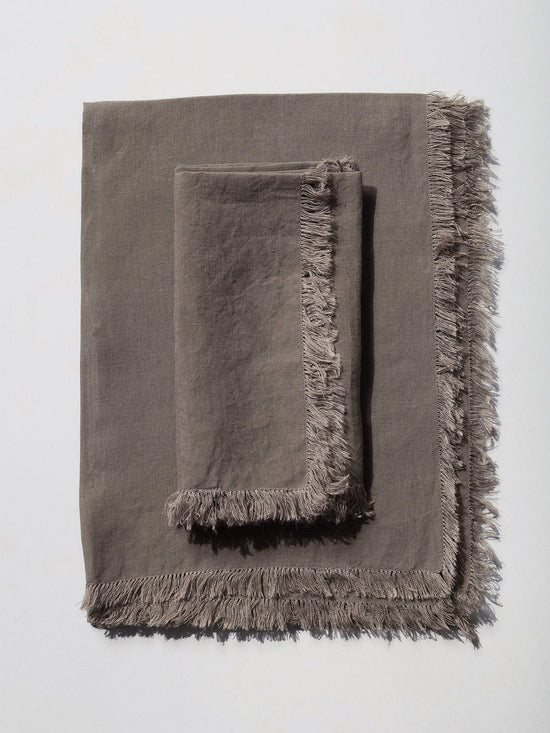 førs studio table runner and napkin set - greige (40% off at checkout)